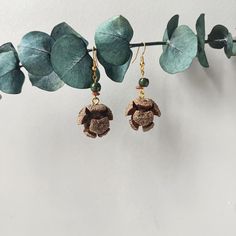 Handmade Pinecone Earrings - Natural Woodland Charm ✨Step into the beauty of the forest with our Handmade Pinecone Earrings. These earrings capture the essence of woodland elegance, featuring real pinecones meticulously preserved and transformed into stunning accessories. Perfect for nature lovers and those who appreciate unique, handcrafted jewelry, these earrings make an exceptional gift for yourself or someone special. Features: 🍃Woodland Beauty:Each pair showcases authentic miniature pineco Nature-inspired Drop Flower Earrings For Pierced Ears, Earthy Dangle Jewelry For Jewelry Making, Bohemian Brown Dangle Flower Earrings, Nature-inspired Gold Earrings With Natural Stones, Gold Nature-inspired Earrings With Natural Stones, Brown Bohemian Drop Flower Earrings, Gold Natural Stones Earrings Nature-inspired, Handmade Nature-inspired Dangle Beaded Earrings, Nature-inspired Beaded Dangle Earrings As Gift