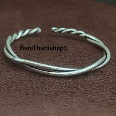 Silver Twist Bangle, Solid 925 Sterling Silver Bangle, Simply Handmade Gifts For Her Adjustable Bangle | Gifts For Her Classic Bangle Handmade item Delivery from a small business in India Materials: Silver,  Style: Boho & hippie Can be personalised Jewelry Details: Benefits of Silver Bangle Wearing jewellery made from this metal does not just look beautiful - it can heal, too. This noble and beautiful metal protects from infections, boosts blood flow and circulation, and regulates body heat. It Adjustable Hypoallergenic Silver Bracelet, Adjustable Silver Stackable Bracelets, Adjustable Nickel-free Silver Bangle, Adjustable Stackable Silver Bracelets, Adjustable Stackable Sterling Silver Bracelet, Minimalist Silver Braided Resizable Bracelet, Handmade Adjustable Silver Bracelets, Minimalist Silver Resizable Braided Bracelet, Silver Minimalist Resizable Braided Bracelet