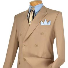 This Classic Double Breasted Suit Features A 6 Button Front, Pleated Pants And A Peak Lapel. Tailored Solid Suits With Buttons, Tailored Solid Color Suits, Semi-formal Solid Color Double-breasted Suits, Semi-formal Solid Double-breasted Suits, Spring Beige Suits With Buttons, Semi-formal Solid Color Suits With Buttons, Classic Semi-formal Sets With Buttons, Tailored Classic Sets With Buttons, Beige Suits With Notch Lapel