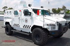 an armored police vehicle parked in a parking lot