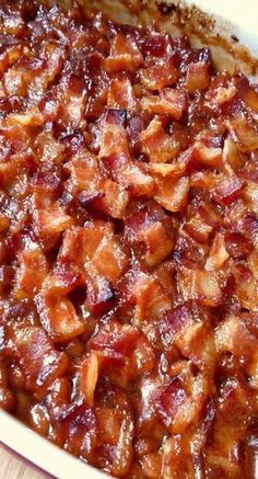 a casserole dish with bacon in it