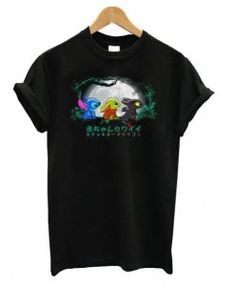 a black t - shirt with an image of two cartoon characters on it