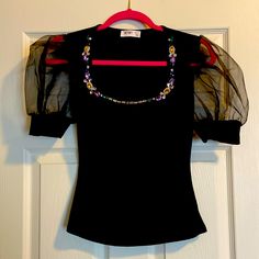 Cute Black Gem Top Sml True To Size. Purchased And Never Worn. Time To Sell. All Gems Intact. New Without Tags. Black Stretch Embellished Tops, Stretch Embellished Black Tops, Glamorous Black Beaded Tops, Fitted Black Embellished T-shirt, Gem Top, Black Gems, All Gems, Black Top, Cute Black