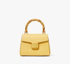 Feel and look perfectly put together with this petite Katy done in textured leather and a bamboo top-handle. | Kate Spade Katy Textured Leather Bamboo Small Top-Handle, Summer Daffodil Luxury Bags Collection, Handbag Heaven, Kate Spade Purse, Angel Art, Unique Styles, Kate Spade Bags, Kate Spade Bag, Small Tops, Handbags On Sale