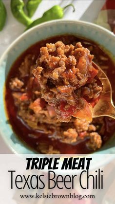 a close up of a spoon in a bowl of food with the title triple meat texas beer chili