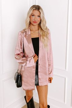 - Elevate your style with this chic satin blazer! Perfect for boss babe energy, whether you're slaying the office or out on the town. It's a must-have for effortless luxe vibes - Sleek material with a satin finish - A built-in lining - A collared v-cut neckline - Long sleeves with faux button accents at the cuffs - Two functional button on the front - A single faux pocket accent cut on the chest - Two low optional pockets that can be un stitched for functional use - A relaxed silhouette that end Elegant Single-breasted Blazer For Date Night, Fall Satin Blazer With Long Sleeves, Fall Satin Blazer For Office, Chic Satin Blazer For Party, Satin Blazer With Long Sleeves For Fall, Chic Satin Party Blazer, Elegant Fall Satin Blazer, Satin Notch Lapel Blazer For Work, Elegant Blazer For Date Night In Spring