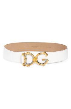 A monogram buckle with gleaming, Baroque-inspired scrollwork highlights this Italian belt made from smooth calfskin leather. 2" belt width; 2 3/4" x 4 1/2" belt buckle Leather Made in Italy Elegant White Belt Buckle, Designer Belt With Gold-tone Rectangular Buckle, Luxury Gold-tone Belt Buckles, Designer Belt With Gold-tone Hardware And Rectangular Buckle, Dolce Gabbana Belt, Luxury Leather Belts With Gold-tone Hardware, A Monogram, White Belt, Black Belt