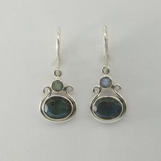 These is a pair of beautiful Earrings with Labradorite. The earrings are made out of solid 925 Silver and there is no nickel or other substances causing most allergies. This makes the earrings hypo allergenic. Size of one Earring in total 3.6 x 1.3 cm or 1.42 x 0.51 inch You will receive the item in a gift box - perfect to surprise someone or yourself. Usually we ship on the same day we receive the payment for the order. We want you to be happy with your purchase. If you do not like what you bou Emerald Green Earrings, Leverback Earrings, Emerald Earrings, Solid 925 Sterling Silver, Beautiful Earrings, Silver 925, Labradorite, Jewelry Earrings Dangle, 925 Silver