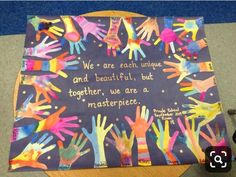 a group of children's handprints on a purple background with the words we are each unique and beautiful but together, we are a masterpiece