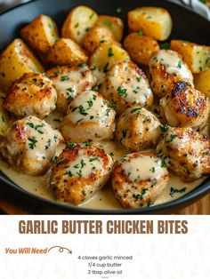 a pan filled with chicken and potatoes covered in gravy on top of a wooden table