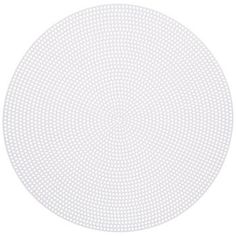 a round white plate with dots on it