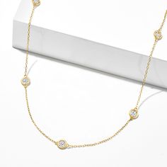 Ross-Simons - 1.00ct t. w. Bezel-Set Diamond Station Necklace in 14kt Yellow Gold. 18". Always in style, any outfit, any occasion. Here's a great opportunity to acquire a classic necklace at a value price. Features five round brilliant-cut, bezel-set diamonds totaling 1.00 carat. Set in polished 14kt yellow gold. Lobster clasp, diamond station necklace. Diamond birthstones are the perfect gift for April birthdays. Classic 14k Gold Diamond Necklace With 17 Jewels, Classic Gold Station Necklace With Brilliant Cut, Yellow Gold Station Necklace With Diamond Accents For Anniversary, Classic 14k Gold Station Necklace, Classic 14k Gold Station Necklace For Formal Occasions, Classic Gold Station Necklace With Single Cut Diamonds, 14k Gold Station Necklace With Diamond Accents For Anniversary, Classic Yellow Gold Diamond Station Necklace, Classic Yellow Gold Station Necklace For Anniversary