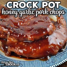 crock pot honey garlic pork chops on a blue plate with text overlay