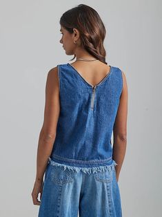 All-over denim isn’t just for tuxedoes with the Wrangler® denim frayed tank. This denim darling comes with our signature stitching down the front and sides, with a zipper down the back for that classic denim look. Made from 100% cotton, this top brings our most durable and comfortable denim on top for a feel that forms to your body, just like your favorite Wrangler jeans. Plus, its frayed edges add a unique definition to your waist for a textured element on any outfit. Dark Wash Denim Top With Frayed Hem, Medium Wash Denim Cutoff Tops, Denim Zipper Closure Top For Summer, Summer Denim Tops With Zipper Closure, Summer Denim Top With Zipper Closure, Denim Cutoff Tops With Frayed Hem, Medium Wash Sleeveless Top With Frayed Hem, Wrangler Women, Short Uggs