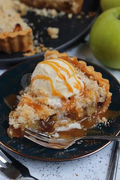 a slice of apple pie with ice cream and caramel drizzle on top