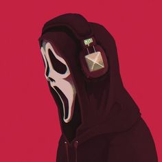 a person in a black hoodie with headphones on and a white mask over their face