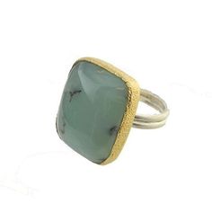 Chalcedony Ring Size 7 The beauty of the gemstone shines through in this polished chalcedony stone ring. Set in .925 sterling silver and 24K gold vermeil this ring will make a statement. Measures approximately 1" long and 0.75" wide. .925 Sterling silver 24K Gold vermeil Chalcedony semi-precious stone Size 7- may be sized Gift Ring With Large Chrysoprase Stone, Elegant Chalcedony Ring With Large Stone, Elegant Chalcedony Rings With Natural Stones, Handmade Gold Chalcedony Rings, Handmade Elegant Chrysoprase Ring, Chalcedony Stone, Chalcedony Ring, Ring Size 7, Stone Ring