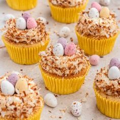 small cupcakes decorated with chocolate and mini eggs