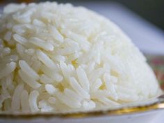 rice in a white bowl on a table