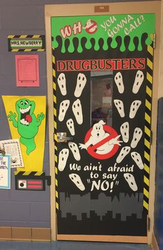 a door decorated to look like a game with ghostbusters on it