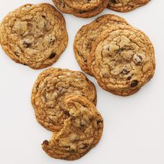 chocolate chip cookies arranged on a white surface