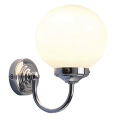 a wall light with a glass ball on the back of it and an arm that is attached