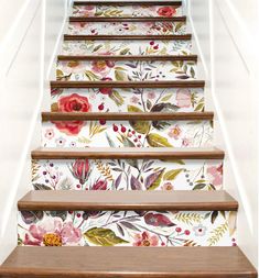 the stairs are decorated with flowers and leaves