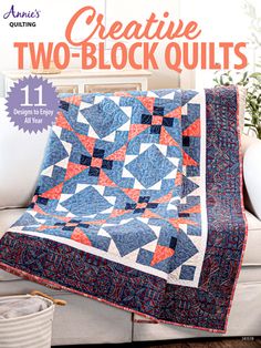 the cover of creative two - block quilts, featuring an image of a couch