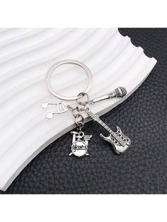 a keychain with a guitar on it