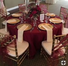 a table set up with place settings and plates for formal dinner or party guests to enjoy