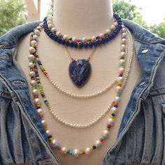 "Bright, vibrant beads make this necklace perfect addition to your summer sundress or a white blouse. African glass beads and 4mm white freshwater pearls are beaded to create a color block strand. You can wear this necklace single, double or even triple! Alone or layered with your favorites, this necklace exudes a playful, eclectic bohemian elegance. Necklace: 49\" plus extender Layer this necklace with: https://www.etsy.com/listing/637252353/baroque-pearl-and-turquoise-necklace?ref=shop_home_ac Bohemian Pearl Chain Necklace For Beach, Bohemian Style Pearl Chain Necklace For Beach, Bohemian Pearl Necklace For Beach, Bohemian Long Single Strand Pearl Necklace, Bohemian Multicolor Pearl Necklace With Pearl Charm, Bohemian Multicolor Beaded Necklace With Pearl Charm, Bohemian Summer Jewelry With Pearl Charm, Multicolor Bohemian Pearl Necklace With Charm, Bohemian Multicolor Pearl Necklace With Charm