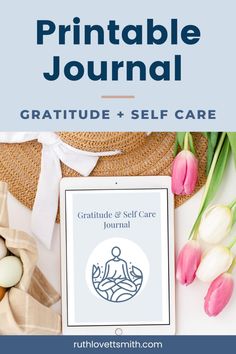 a tablet with the text, printable journal gratitude and self care on it next to tulips