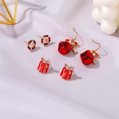 Product information:Style: European and AmericanMaterial: AlloyType: EarringsStyle: Women'sStyling: ChristmasPopular elements: metal. geometric Red Alloy Jewelry For Party, Red Alloy Jewelry As A Gift, Valentine's Day Party Earrings Made Of Alloy, Valentine's Day Party Earrings In Alloy, Red Christmas Earrings For Holiday, Red Earrings For Christmas Holiday, Red Metal Earrings For Party, Single Red Earring Gift, Single Red Earring For Gift