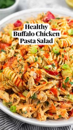 healthy buffalo chicken pasta salad in a white bowl with text overlay that reads, healthy buffalo chicken pasta salad