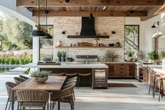 an outdoor kitchen and dining area is shown