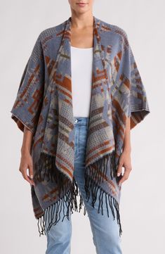 Chilly weather calls for this cozy fringe-trimmed jacquard topper that you'll love to layer. 43" length (one size) Open front Three-quarter sleeves 100% acrylic Hand wash, dry flat Imported Multicolor Fringe Shawl For Winter, Fringe Knit Outerwear With Long Sleeves, Chic Long Sleeve Fringe Cardigan, Knit Long Sleeve Outerwear With Fringe, Bohemian Fringe Winter Cardigan, Chilly Weather, Swimwear Cover Ups, Three Quarter Sleeves, Vince Camuto