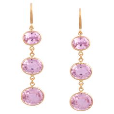 Tresor Beautiful Earring feature 13.645 carats of Kunzite. The Earring is an ode to the luxurious yet classic beauty with sparkly gemstones and feminine hues. Their contemporary and modern design make them perfect and versatile to be worn at any occasion. Classic Oval Earrings With Gemstone Accents, Elegant Oval Gemstones With Accents, Oval Gemstone Accented Earrings For Formal Occasions, Luxury High Luster Oval Earrings, Oval Earrings With Gemstone Accents For Formal Occasions, Fine Jewelry Oval Earrings With High Luster, Luxury Oval Gemstone Earrings, Marquise Diamond Earrings, Gold Oval Earrings