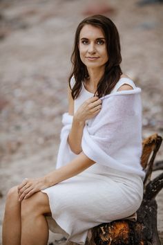 Wedding pure white cape shawl, wedding wrap mohair, bridal scarves shawl, wedding shawl ivory, bridal shawl cape, women scarf shawl, bridal shawl knit This light ivory wedding shawl is made of soft kid mohair and silk yarn. (75 % soft mohair and 25 % silk). It will look good with any type of clothing for many occasions: wedding, theater, garden party, birthday party. Lovely, breeze and comfortable, long and wide knitted natural scarf/shawl/wrap. Measurements: Width: 70 cm = 27.5 inches Measureme White Shawl Wrap For Wedding, Elegant White Shawl Wrap, Elegant White Winter Wrap, White Shawl Wrap Scarf, Cape Women, White Cape, Cape Shawl, Bridal Shrug, Wedding Shrug