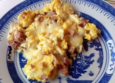 a blue and white plate with food on it