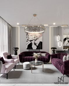 a living room filled with purple couches next to a chandelier and table