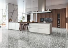 a large kitchen with marble floors and white cabinets is pictured in this artist's rendering