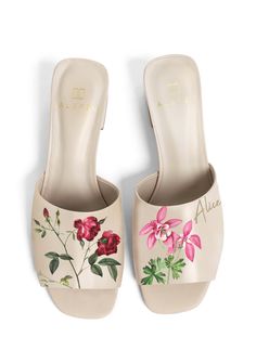 No two ALEPEL pieces are exactly alike, creating a precious rarity in the collection. All shoes are made in Brazil using high-quality techniques and hand-painted by local artists in the Miami area. Pastel floral blooms embellish the front of these fresh, detailed heels. Personalize these shoes with your initials or name up to 7 letters. Product Details 100% leather. Slip-on, open-toe slide. 2-inch heel. Hand-painted. Care Instructions To clean, delicately wipe with a damp cloth. Size & Fit All w Painted Monogram, Shoes Painting, Romantic Nature, Monogram Painting, Black And White Girl, Beige Heels, Pastel Floral, Custom Painted, 2 Inch Heels