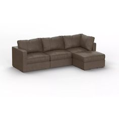 a brown leather sectional sofa sitting on top of a white floor