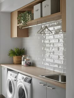 a washer and dryer in a small room