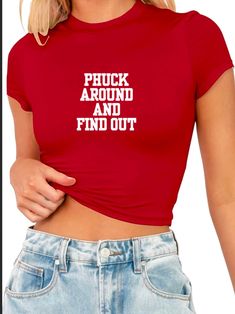 a woman wearing a red crop top with the words pick around and find out on it