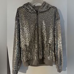 New. Never Worn. No Tags. Victoria's Secret Women's Grey And Silver Jacket Medium Fabulous Limited Edition Victoria's Secret Pink Faux Fur And Silver Leopard Print (Seriously) Zip-Front Hoodie. Very Heavy And Cozy And So, So Extra. Oversized. Jersey Lined. Ribbed Hem And Cuffs. 22" Across Dropped Shoulders 20" Pit To Pit 26" Back Of Collar To Hem. Silver Sequined Outerwear For Fall, Gray Long Sleeve Outerwear For Party, Gray Long Sleeve Party Outerwear, Silver Sequined Outerwear For Winter, Silver Sequined Winter Outerwear, Winter Silver Sequined Outerwear, Mint Green Sweater, Oversized Jersey, Silver Jacket