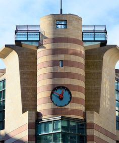 a large clock on the side of a building