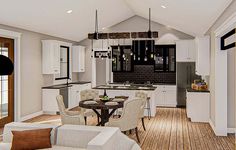 a large open concept kitchen and living room with wood flooring, white cabinetry, and an island