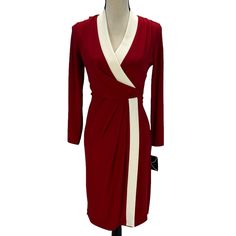 Kasper Long Sleeve V-Neck Faux Wrap Midi Dress - Red Cream Of Note: The Color Of This Item Is A Brighter Red. Most Accurately Represented In The 2nd Photo That Is A Close Up. Condition: New With Tags. No Rips, Tears Or Damage To The Fabric Noted. Pockets: None Lining: Yes Size: Xs; Medium; Color: Red / Cream Material: 96% Polyester / 4% Elastane | Lining= 100% Polyester Care: Dry Clean Fabric Stretch: Up To 1 1/2 Inches Closure: Pull Over Measurements: (Laying Flat; Not Stretched) Xsmall - 32“ C Red V-neck Dress With Surplice Neckline For Evening, Red Fitted V-neck Dress With Surplice Neckline, Red Knee-length V-neck Dress For Formal Occasions, Chic Red V-neck Dress For Formal Occasions, Elegant V-neck Dress For Holiday, Red V-neck Dress For Spring Formal, Red V-neck Dress For Formal Spring Occasions, Elegant Red V-neck Dress For Fall, Wrap Midi Dress