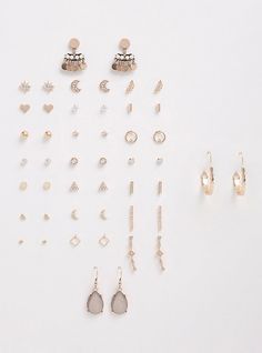 You're literally never going to run out of cute earrings again now that you have this set. With 24 pairs, all in gold tone metal, the designs vary from textured hoops to shimmering crescent moons. Set of 24. Base metals. Imported. The best plus size women's celestial earring set earrings sets in gold. Torrid is your destination for cozy fall and winter clothes to keep you warm and comfortable. Photographing Jewelry, Earrings Sets, Affordable Plus Size Clothing, Diamond Shape Earrings, Flat Back Earrings, Packing Jewelry, Plus Size Clothes, Cute Necklace, Run Out